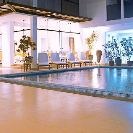 Mc Hotel Ика Екстериор снимка