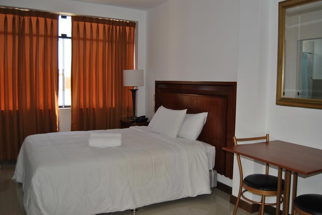 Mc Hotel Ика Екстериор снимка