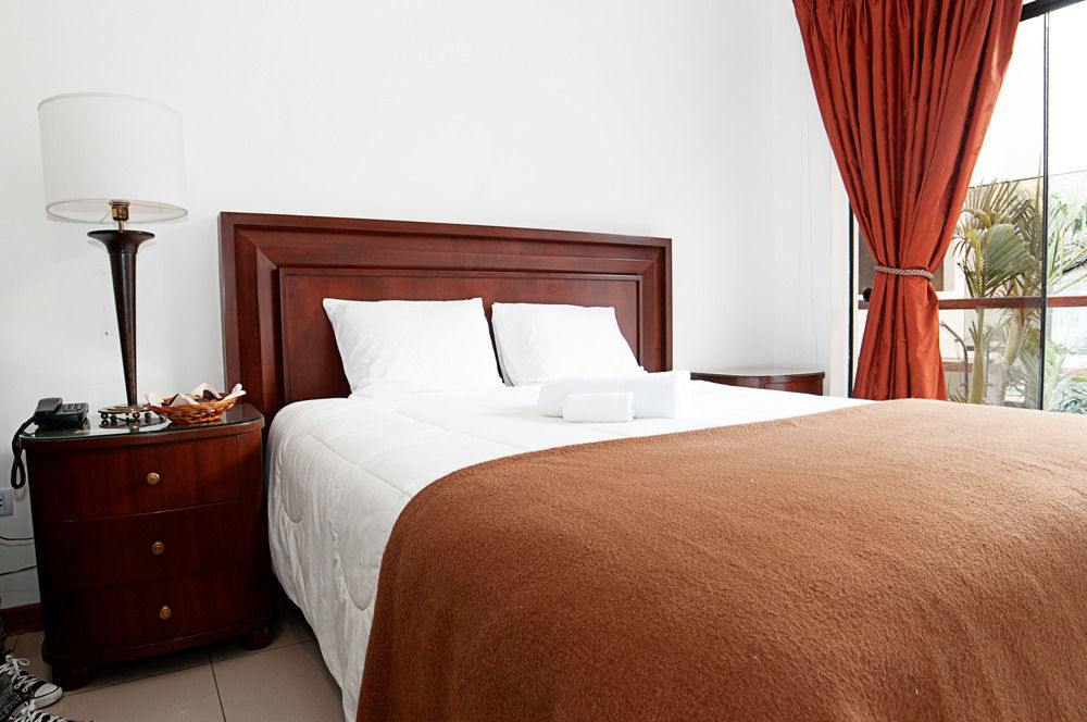 Mc Hotel Ика Екстериор снимка